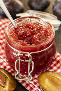 Close-up of food in jar on table