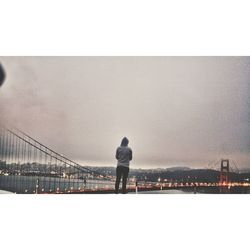 Woman standing against sky