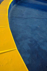High angle view of blue and yellow architectural detail 