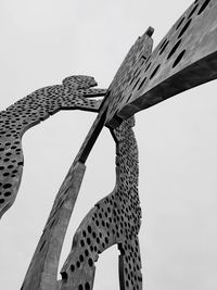 Low angle view of giraffe against sky