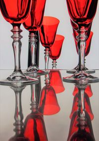 Close-up of wine glasses on table