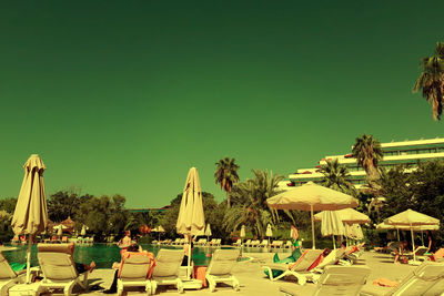 Panoramic view of beach against clear sky