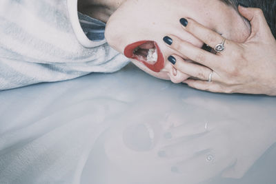 Close-up of woman lying down