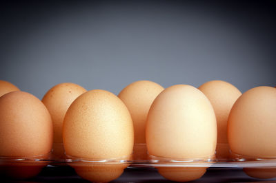 Close-up of eggs in row