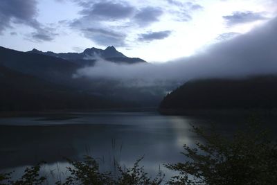 Scenic view of lake against mountain range