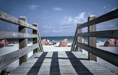 Pier over sea against sky