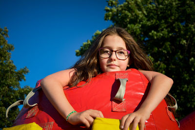 Portrait of girl with inflatable toy