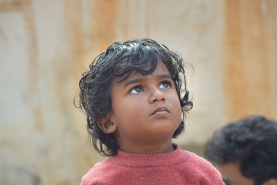 Close-up of young woman looking away