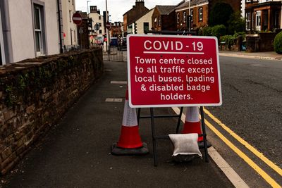 Information sign on road in city