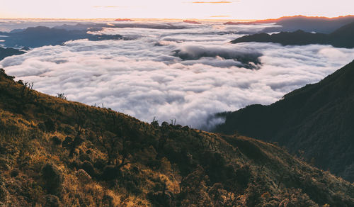 High angle view of mountains against sky during sunset