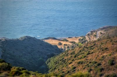 High angle view of landscape and sea