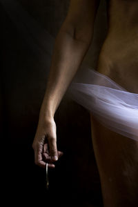 Low section of man with tattoo