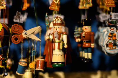 Close-up of toys hanging at store