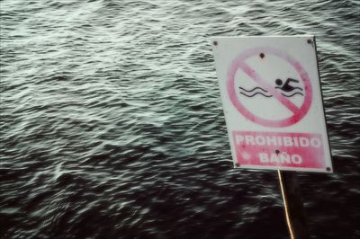 Information sign in water
