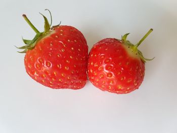 Close-up of strawberries against white background