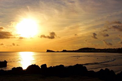 Scenic view of sea at sunset