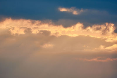 Low angle view of clouds in sky during sunset