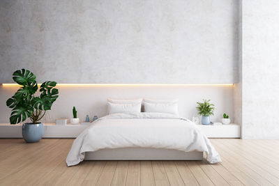 White potted plants on table at home