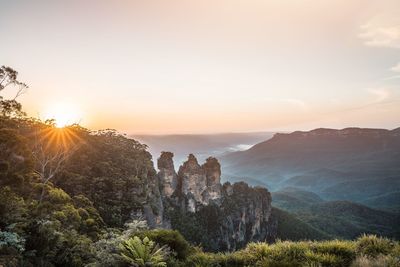 Scenic view of mountains against sky during sunset