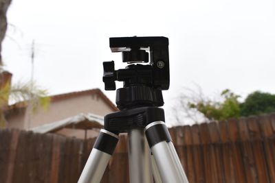 Close-up of camera against black background