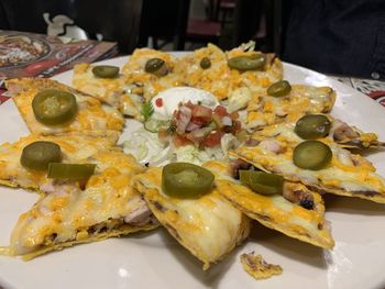 High angle view of pizza in plate on table