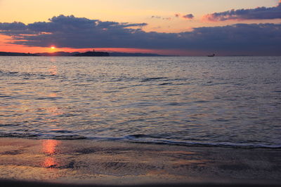 Scenic view of sea at sunset