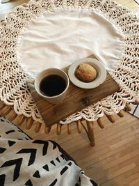 High angle view of coffee cup on table