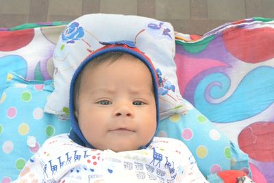 Portrait of cute baby lying down