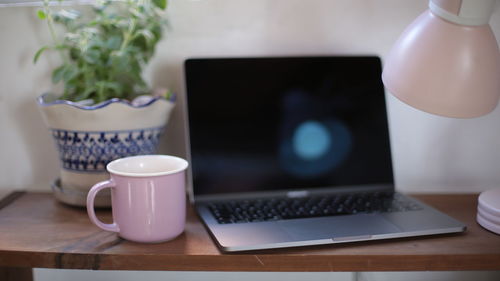 Coffee cup on table