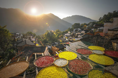 Drying pepper and corn in the sun