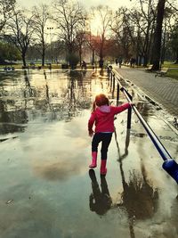 Full length of woman on field during winter