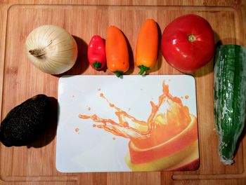 High angle view of vegetables on cutting board