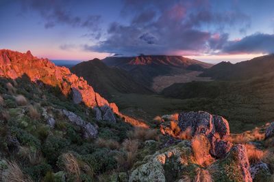 Scenic view of mountains against sky during sunset