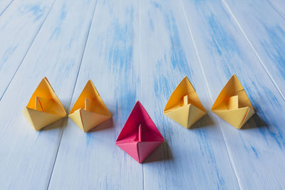 High angle view of paper boats on table