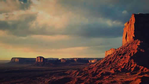 Scenic view of landscape against sky during sunset