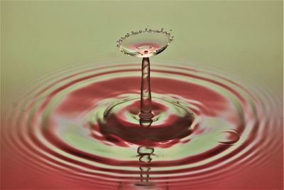 Close-up of drop falling in water