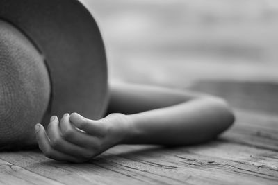 Close-up of woman lying on table