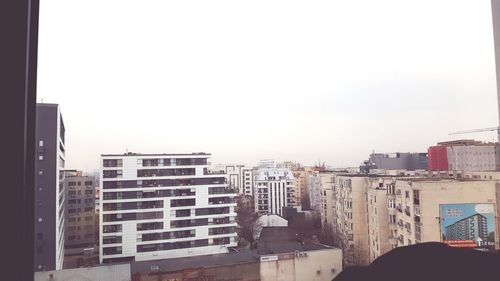 Cityscape against clear sky