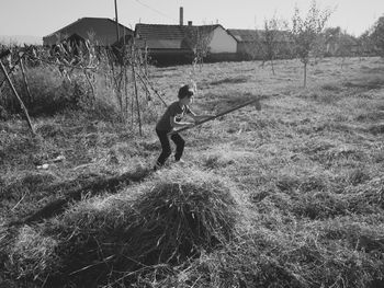 Full length of man playing on field