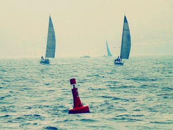 Boat sailing in sea