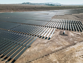 Renewable solar energy solar farm in the desert of southern nevada on a dry lake bed.