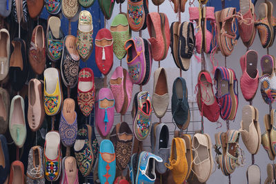 Full frame shot of shoes for sale at market