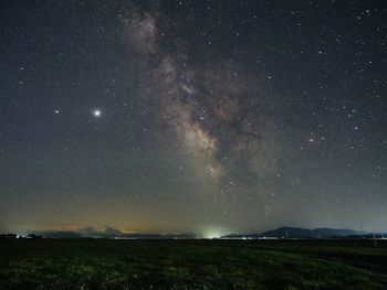 Scenic view of star field against sky at night