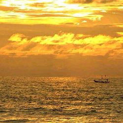 Scenic view of sea at sunset