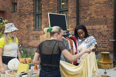 Young women at yard sale