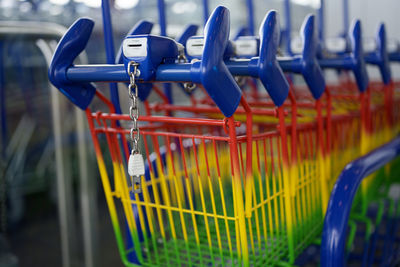 Close-up of colorful shopping cart