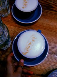 High angle view of coffee cup on table