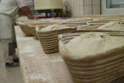 Low section of chef working in commercial kitchen