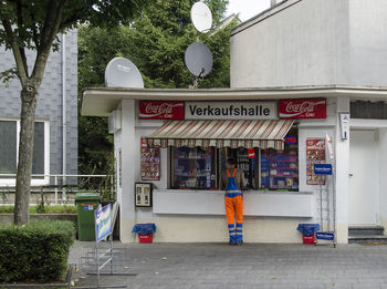 Man standing on street in city