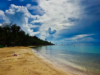 Scenic view of beach against sky